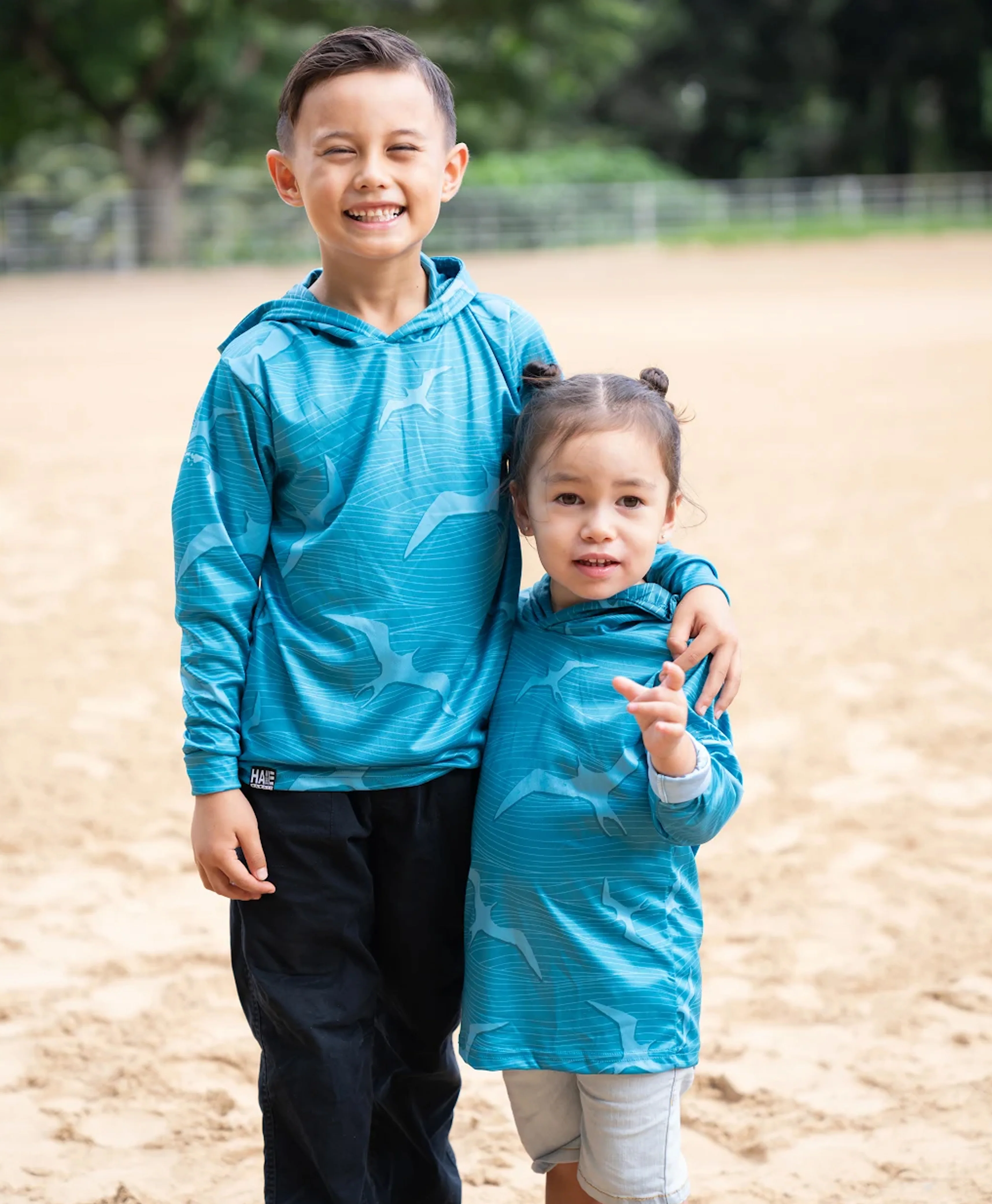 Na Iwa Waves Youth Hooded Longsleeve Drifit Teal - Image 2